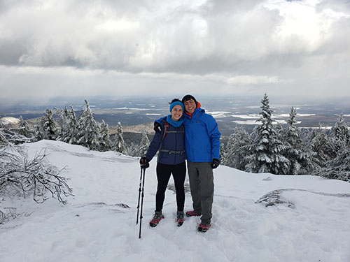 Louisa Bauer and a man cross-country skiing in winter