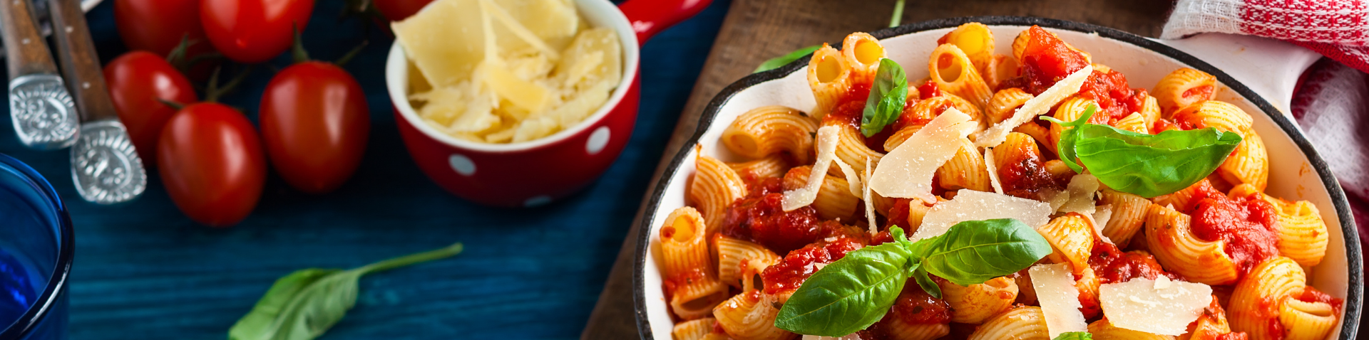 Close-up view of a bowl of pasta with a garnish