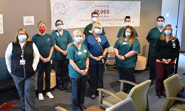 a group of medical assistants with two clinical team members