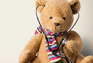 Teddy bear wearing a stethoscope